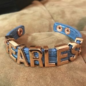 BCBG inspiration quote faux leather snap bracelet